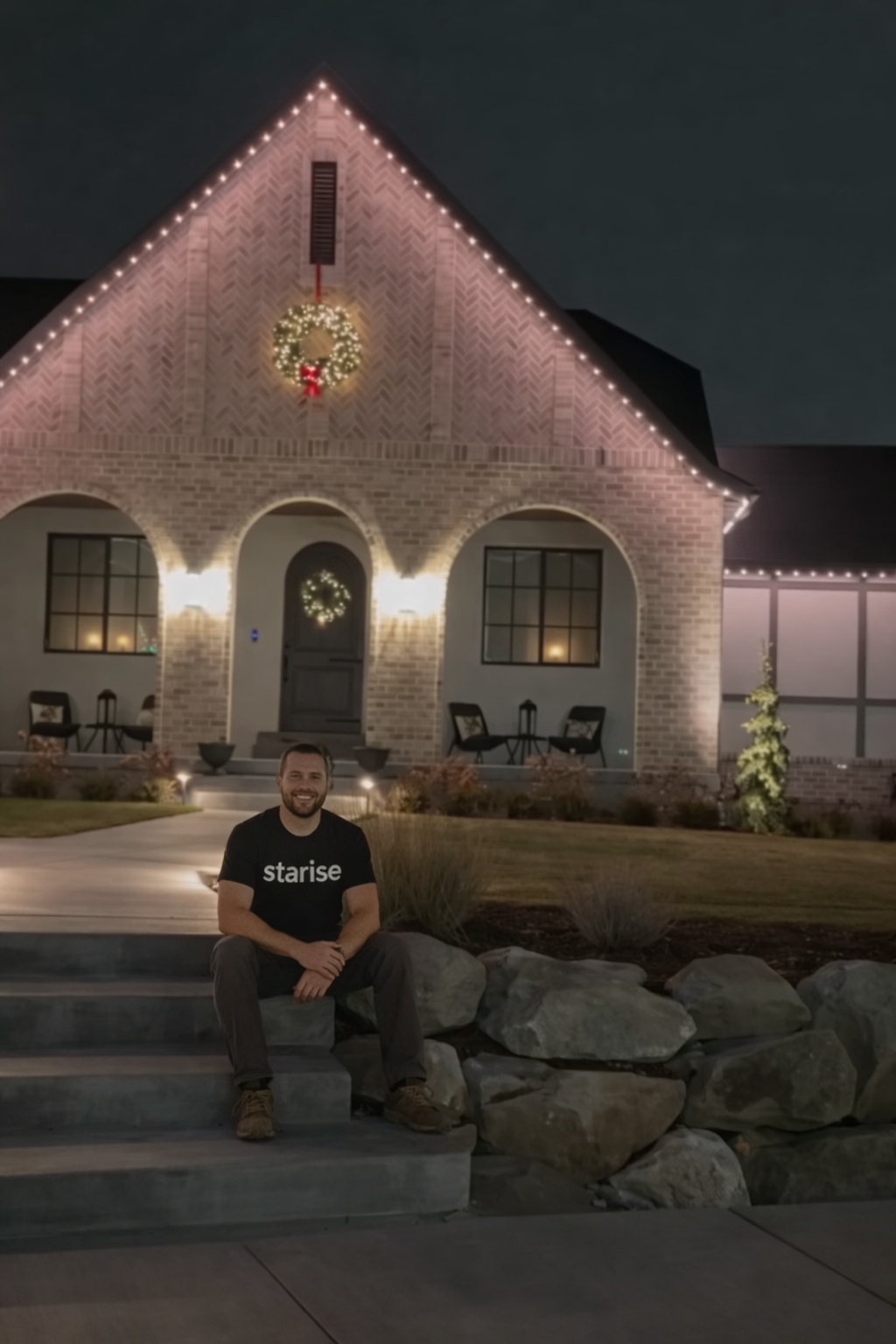 App-controlled permanent RGBW lighting on Calgary home showing colour options