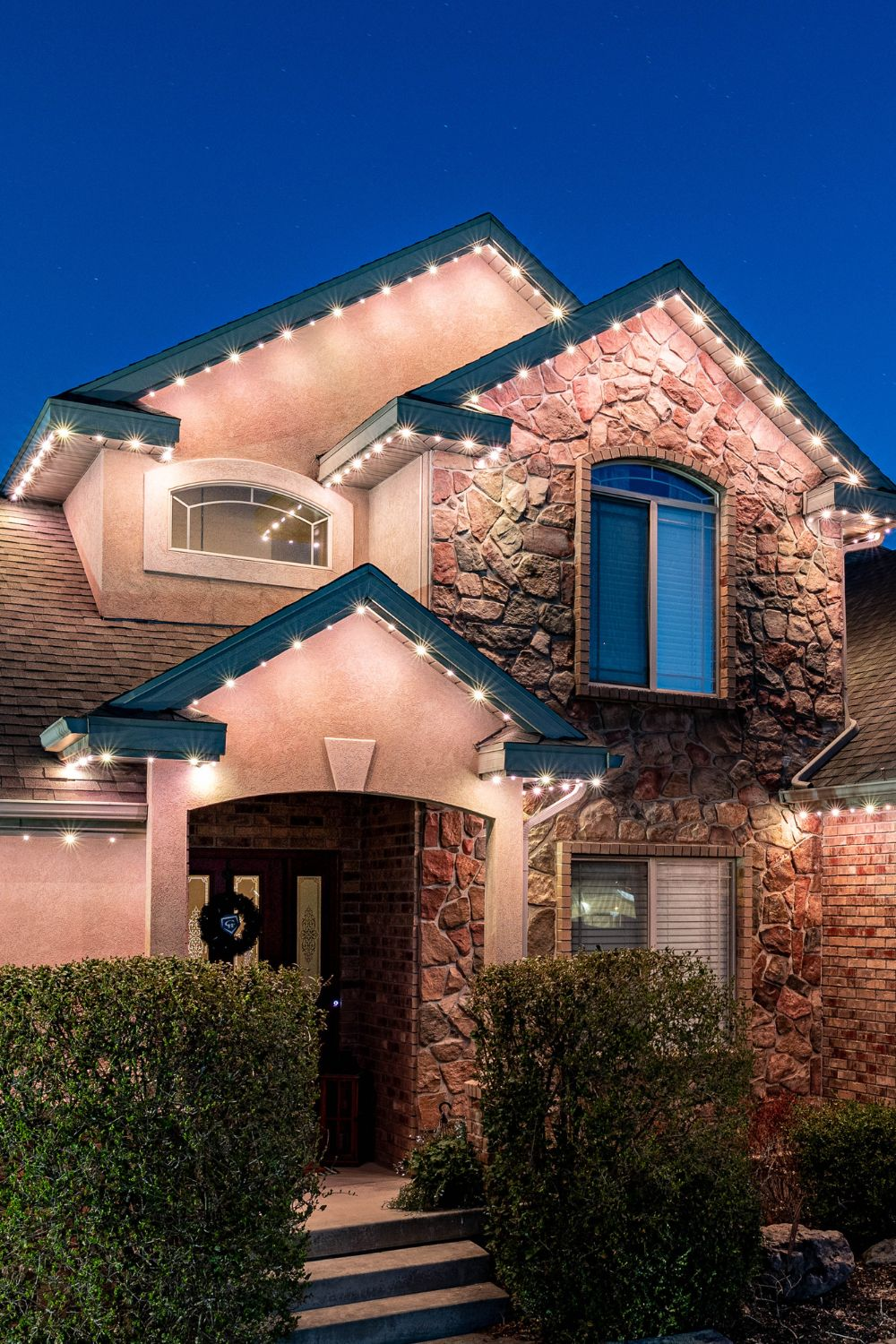 Smart permanent lighting controlled via Starise app on Calgary home