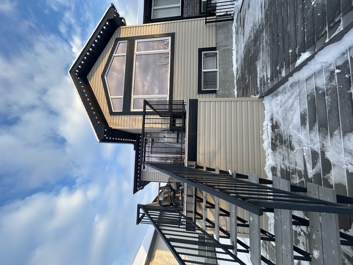 Permanent white LED lighting on Calgary infill home with modern architecture