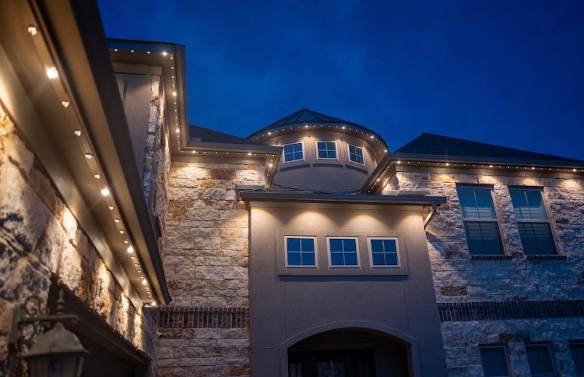 Permanent warm white accent lighting on an Okanagan home