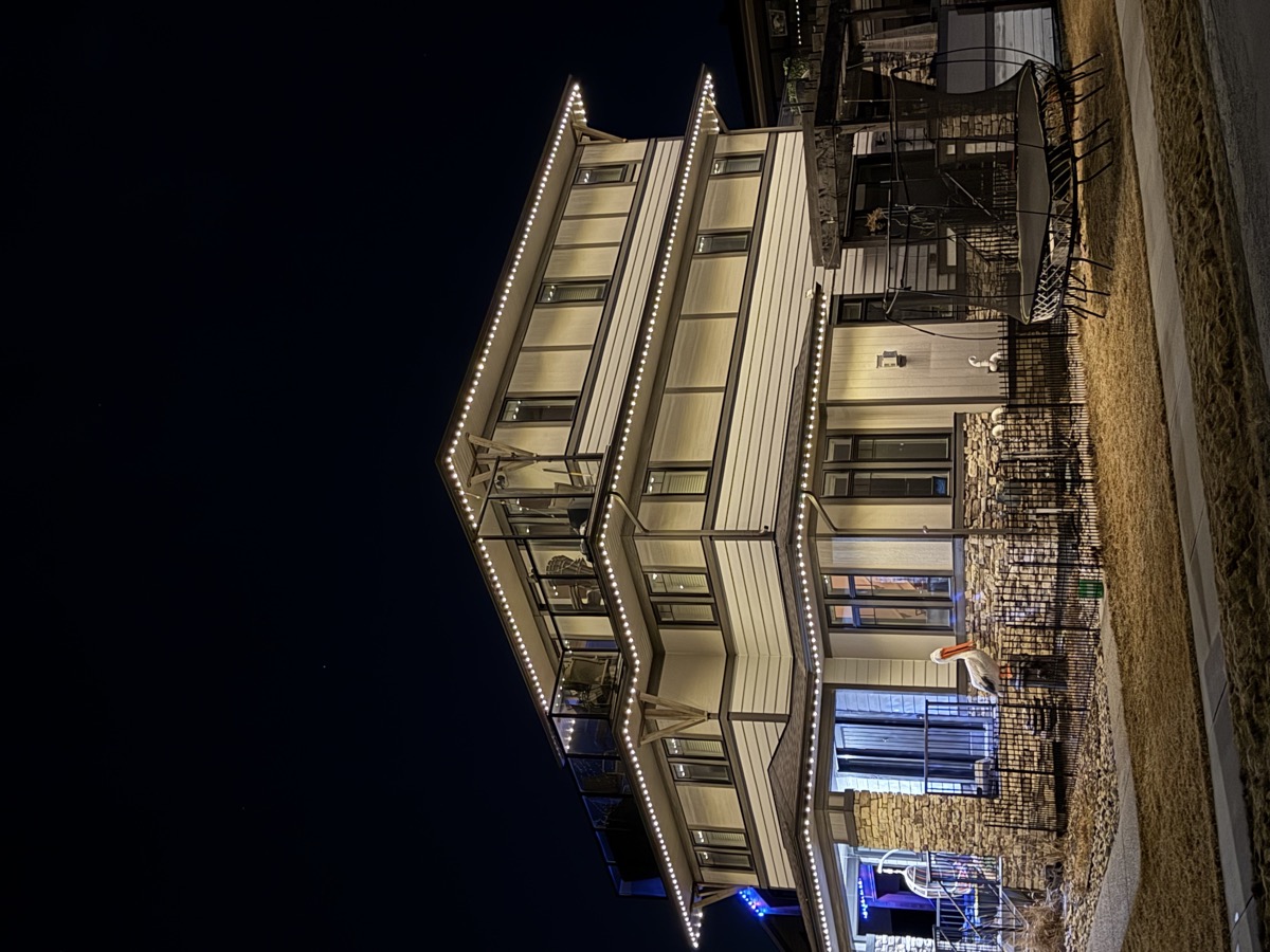 Premium permanent outdoor lighting installation on Calgary luxury home