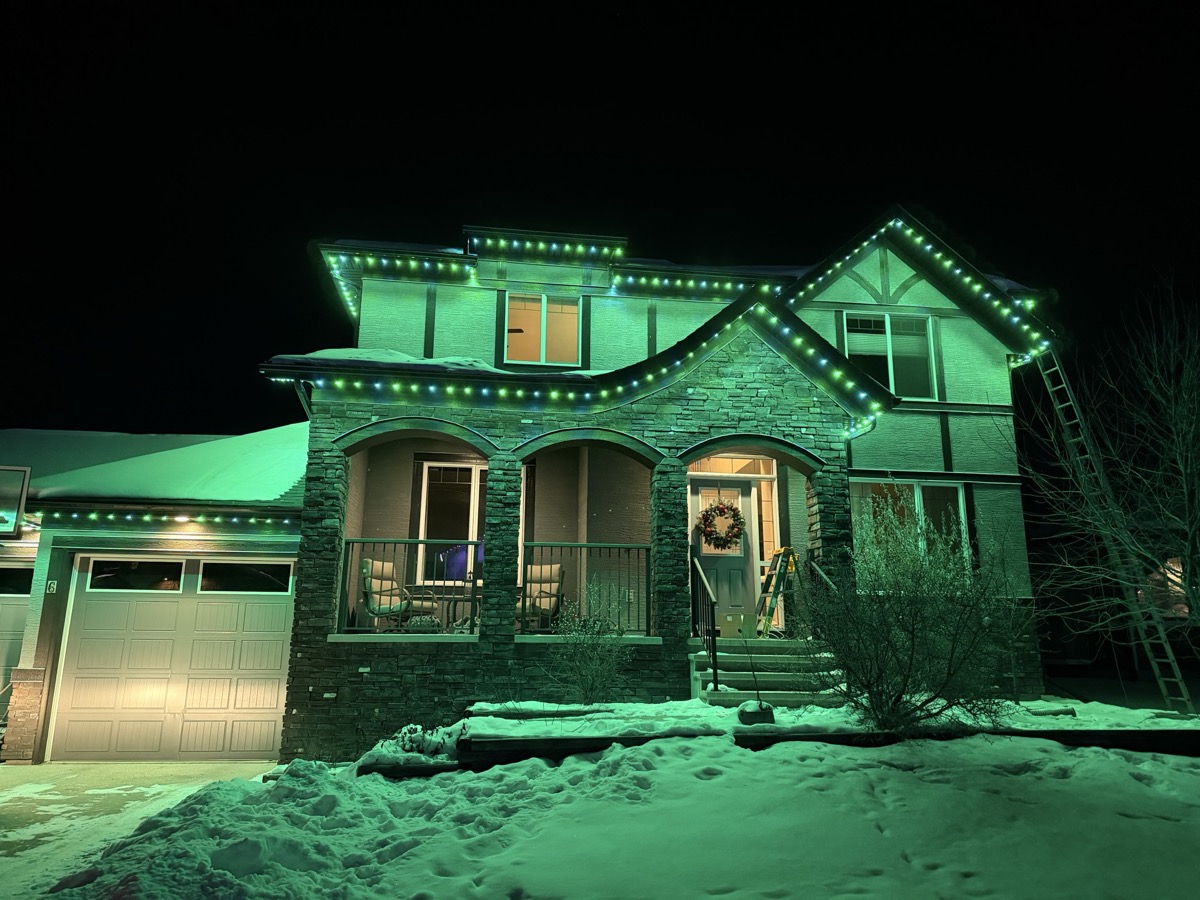 Permanent LED lights in pink for breast cancer awareness on Calgary home