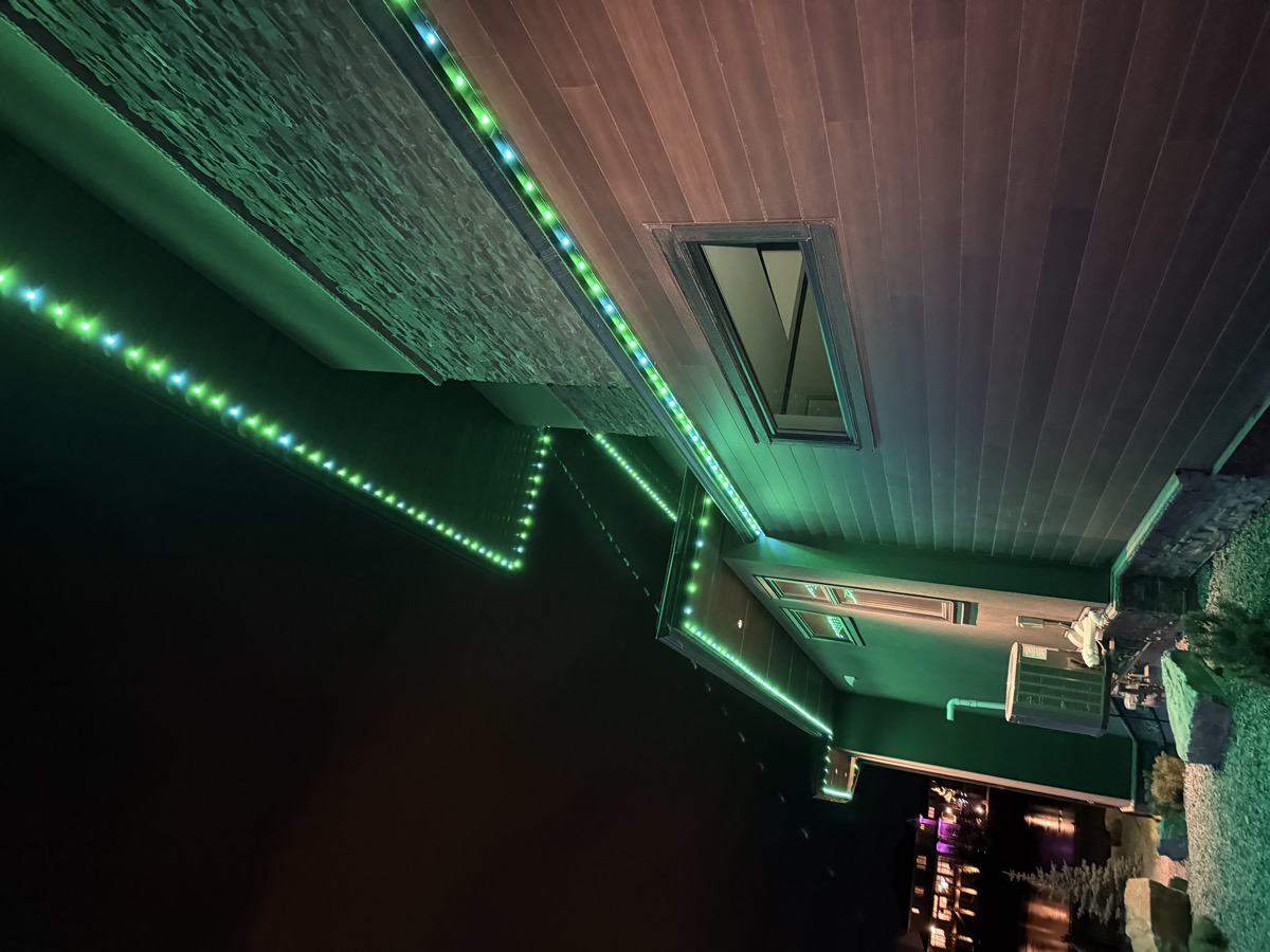 Permanent LED lights in celebratory colour scheme on Calgary home for special occasion