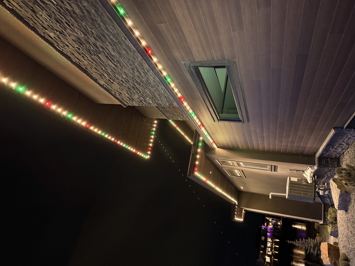 RGBW permanent lighting programmed for birthday celebration on Calgary home