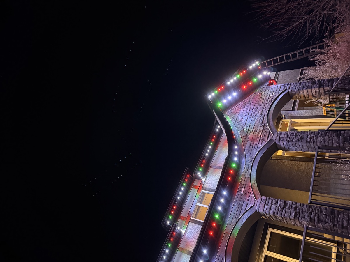 Permanent LED lights set to festive holiday colours on Calgary neighbourhood home