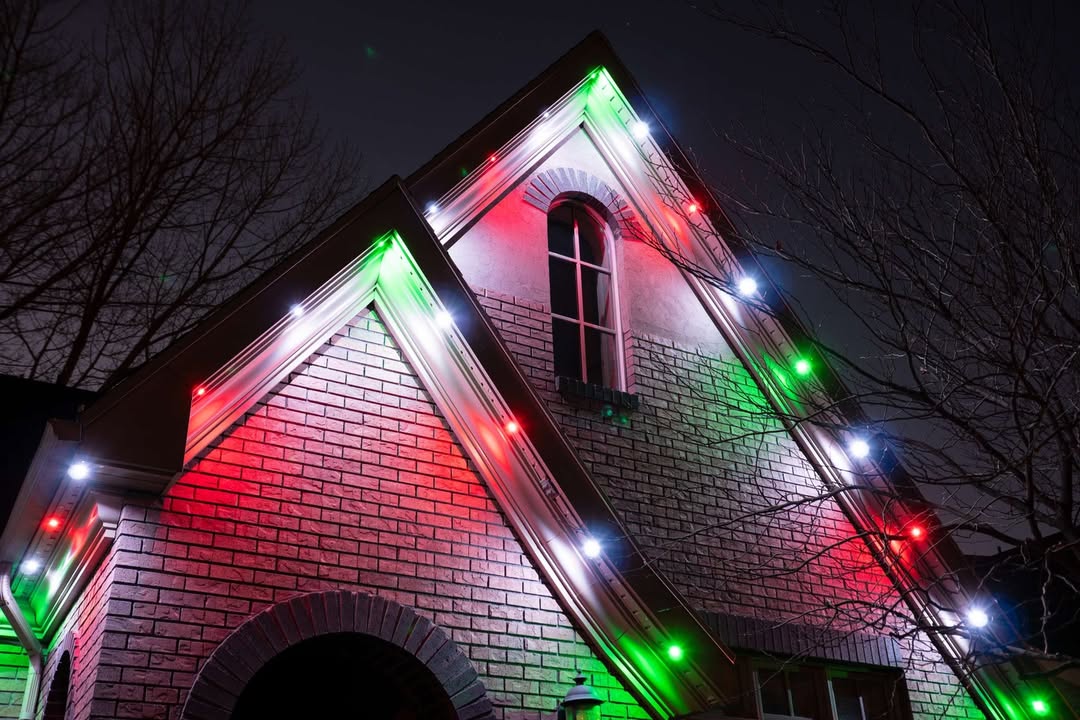 Colourful permanent Christmas lighting on Calgary home during winter season