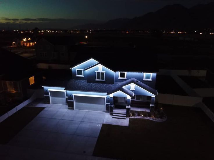 Permanent outdoor security lights on Calgary home with motion-sensor capability