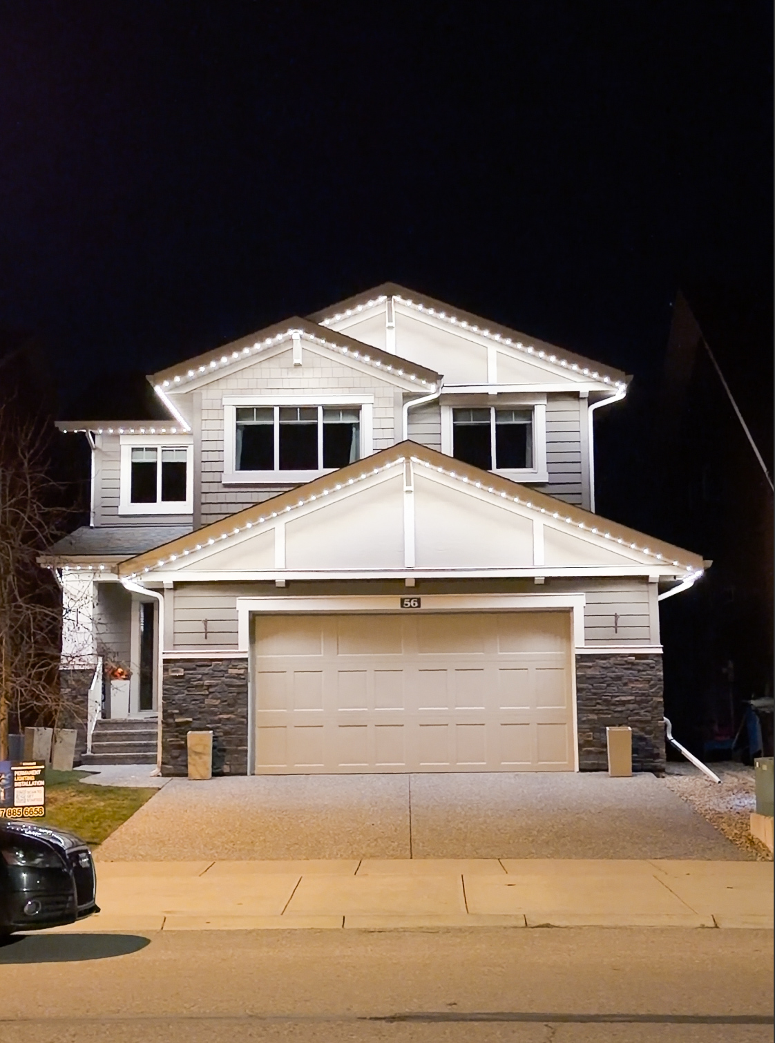 Permanent bright white security lighting on Calgary home side yard and garage