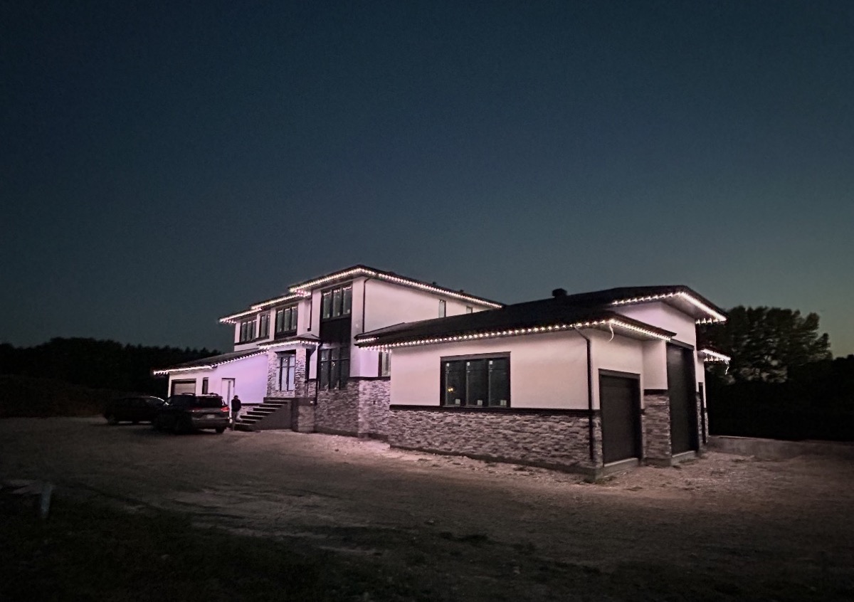 Permanent LED security lights providing safe pathway lighting on Calgary home