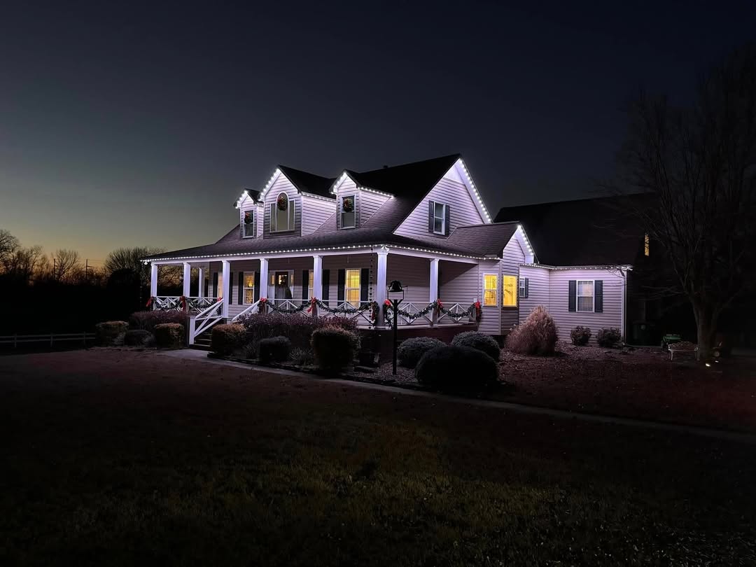 Permanent outdoor security lights providing full coverage on Calgary home exterior