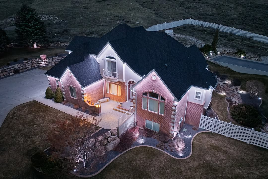High-output permanent LED security lights on Calgary home garage and entrance